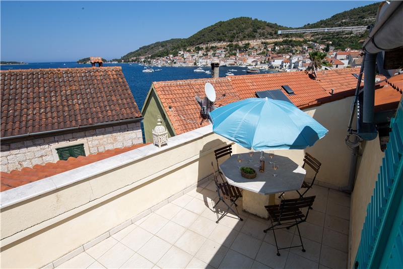 The roof terrace at villa VS001, looking over Vis harbour