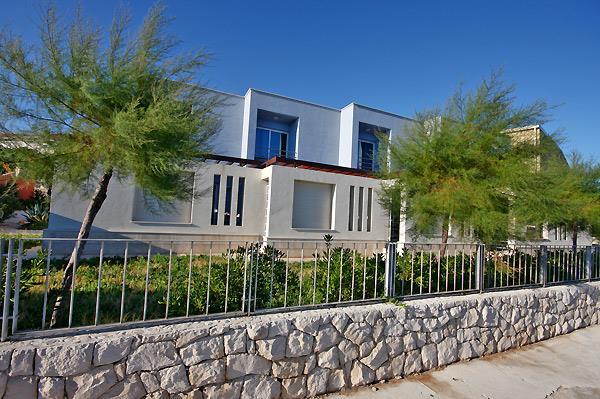 Beachfront villa in Postira, photograph 1