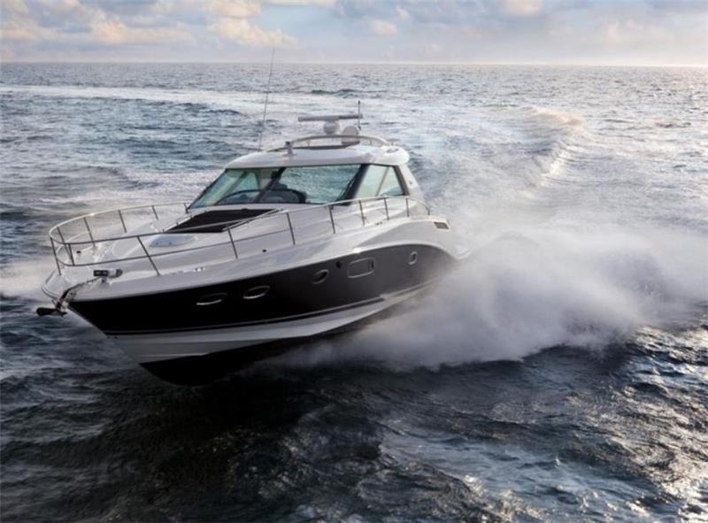 A motor boat cutting across open water off Hvar
