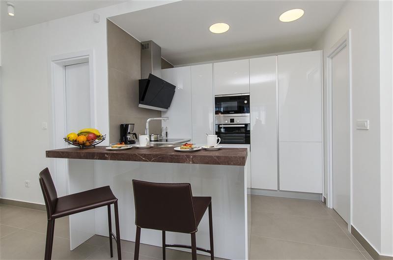 5 bedroom beachfront villa with heated pool near Omis, sleeps 9