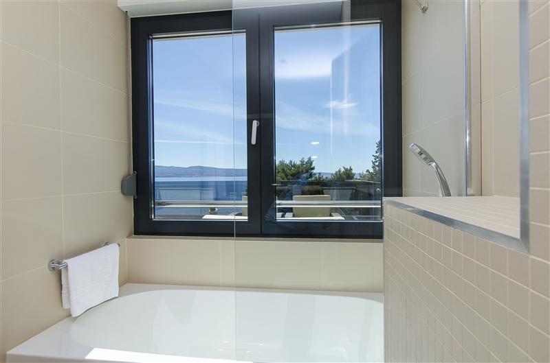 5 bedroom beachfront villa with heated pool near Omis, sleeps 9