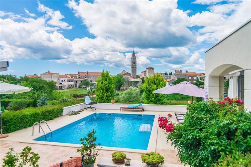 The pool at Svetvinčenat, the village tower behind